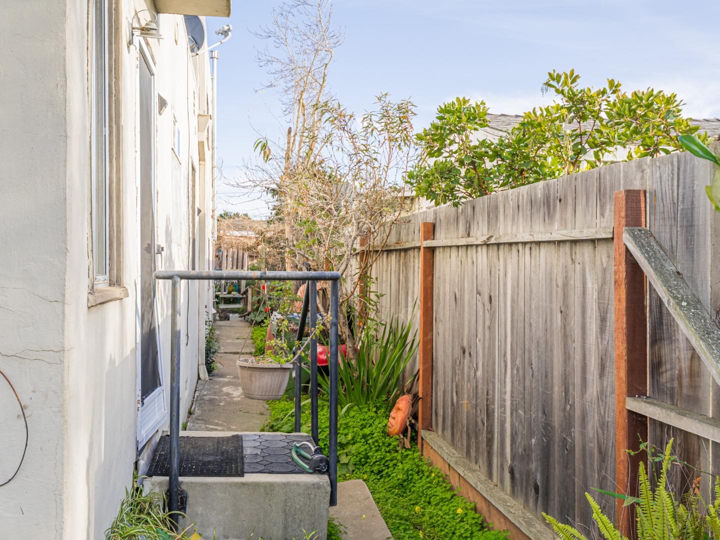 9 Memorial Avenue Freedom, CA 95019 - Photo 15 of 18 a view of a pathway of a wooden fence