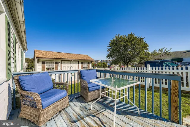 a view of a chairs on the deck