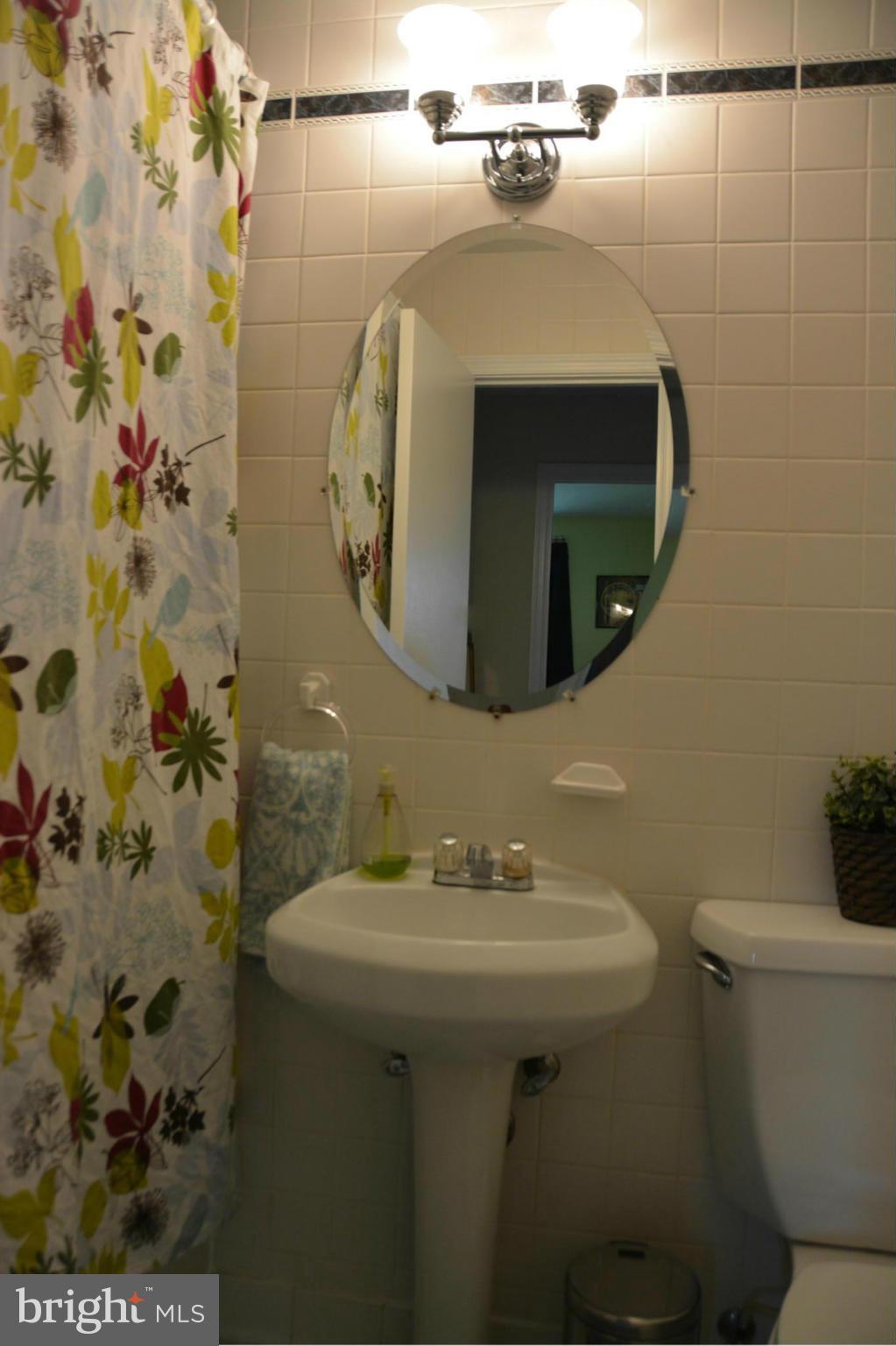 8927 Burke Lake Road Springfield, VA 22151 - Photo 22 of 24 Main Level Hall Full Bath