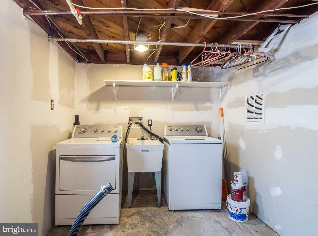 218 St Marys Road Baltimore, MD 21221 - Photo 26 of 31 Basement Laundry Area- Washer & Dryer AS IS