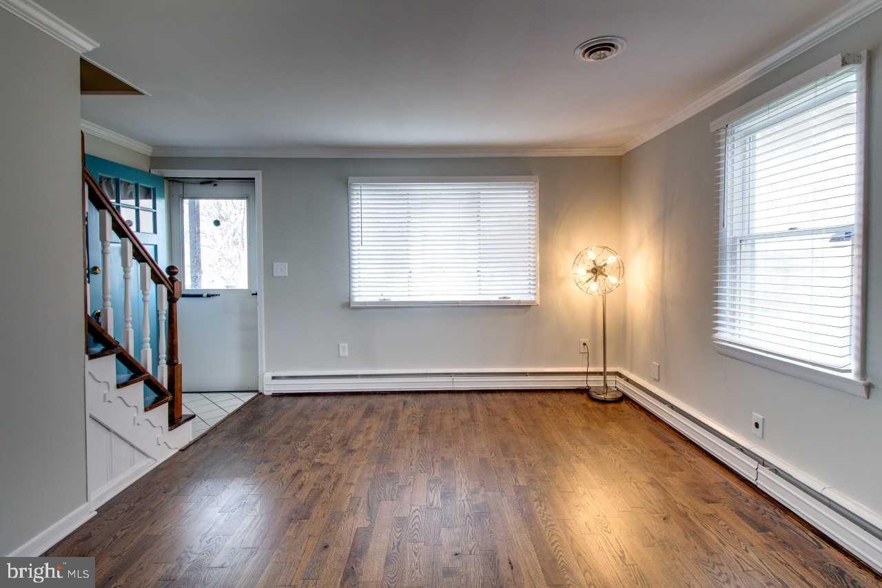 218 St Marys Road Baltimore, MD 21221 - Photo 4 of 31 Living Room with refinished Hardwood Floors
