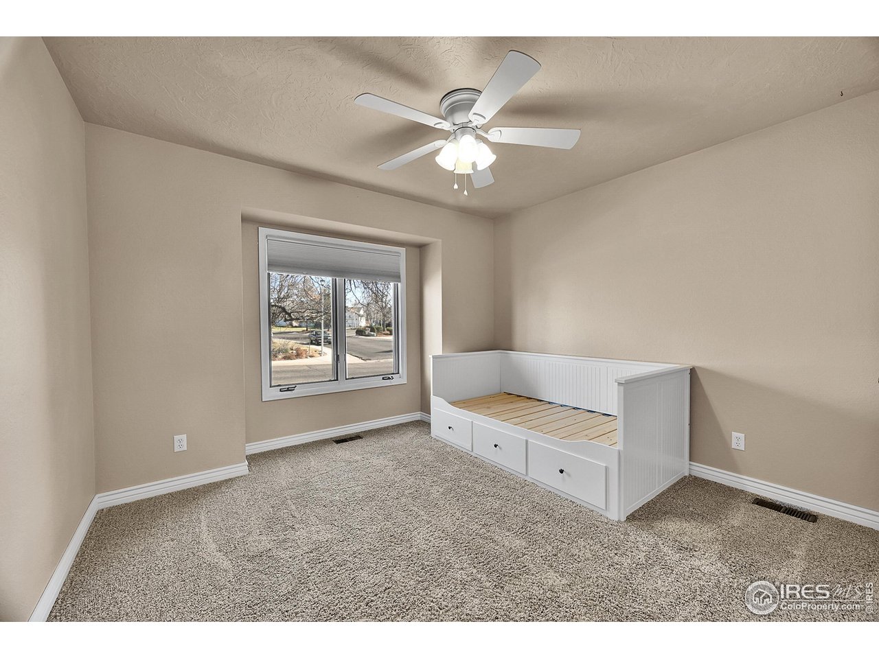 1420 Falcon Ridge Road Eaton, CO 80615 - Photo 26 of 48 Guest Bedroom 2 - Main Floor