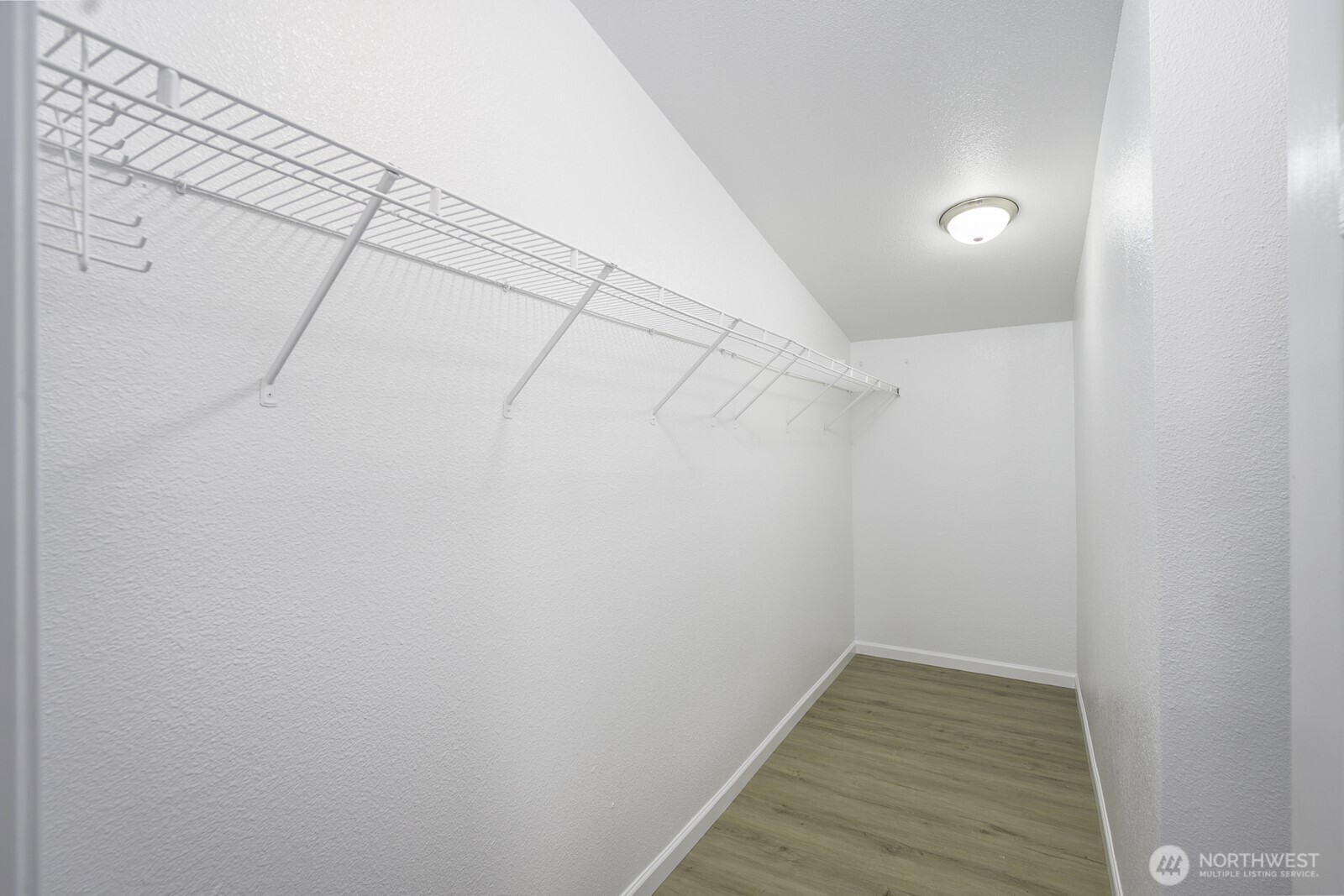 4948 Northeast E 7 Road Moses Lake, WA 98837 - Photo 11 of 22 a view of a room with racks on the wall