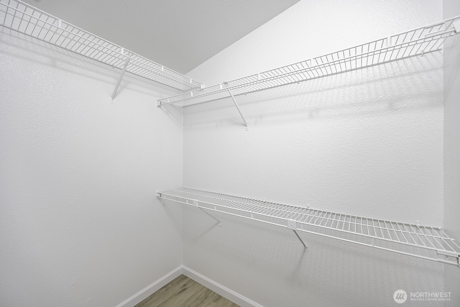 4948 Northeast E 7 Road Moses Lake, WA 98837 - Photo 15 of 22 a view of a room with racks on the wall