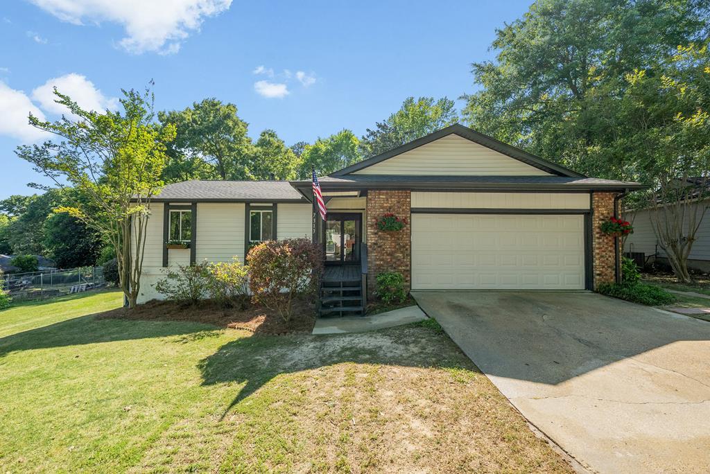 a view of a house with garden