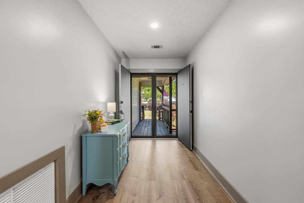 7313 Sesame Street Columbus, GA 31909 - Photo 20 of 43 a room with wooden floor and windows
