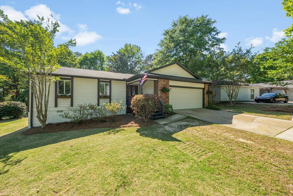 7313 Sesame Street Columbus, GA 31909 - Photo 41 of 43 a view of a house with backyard and sitting area