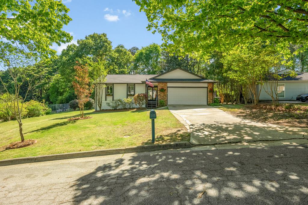 7313 Sesame Street Columbus, GA 31909 - Photo 42 of 43 a view of a house with a patio