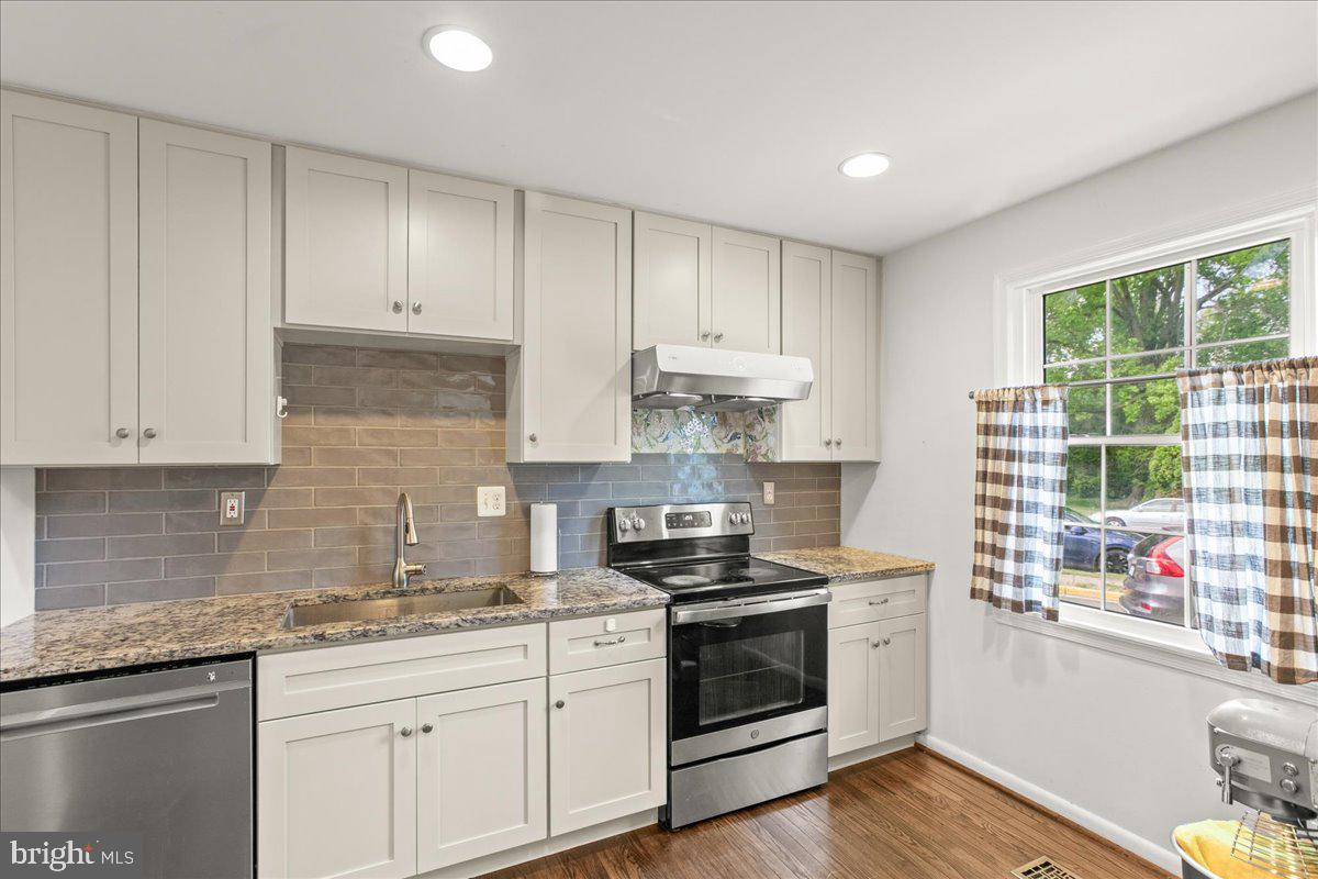7213 Evanston Road Springfield, VA 22150 - Photo 13 of 37 Modern kitchen with natural light.