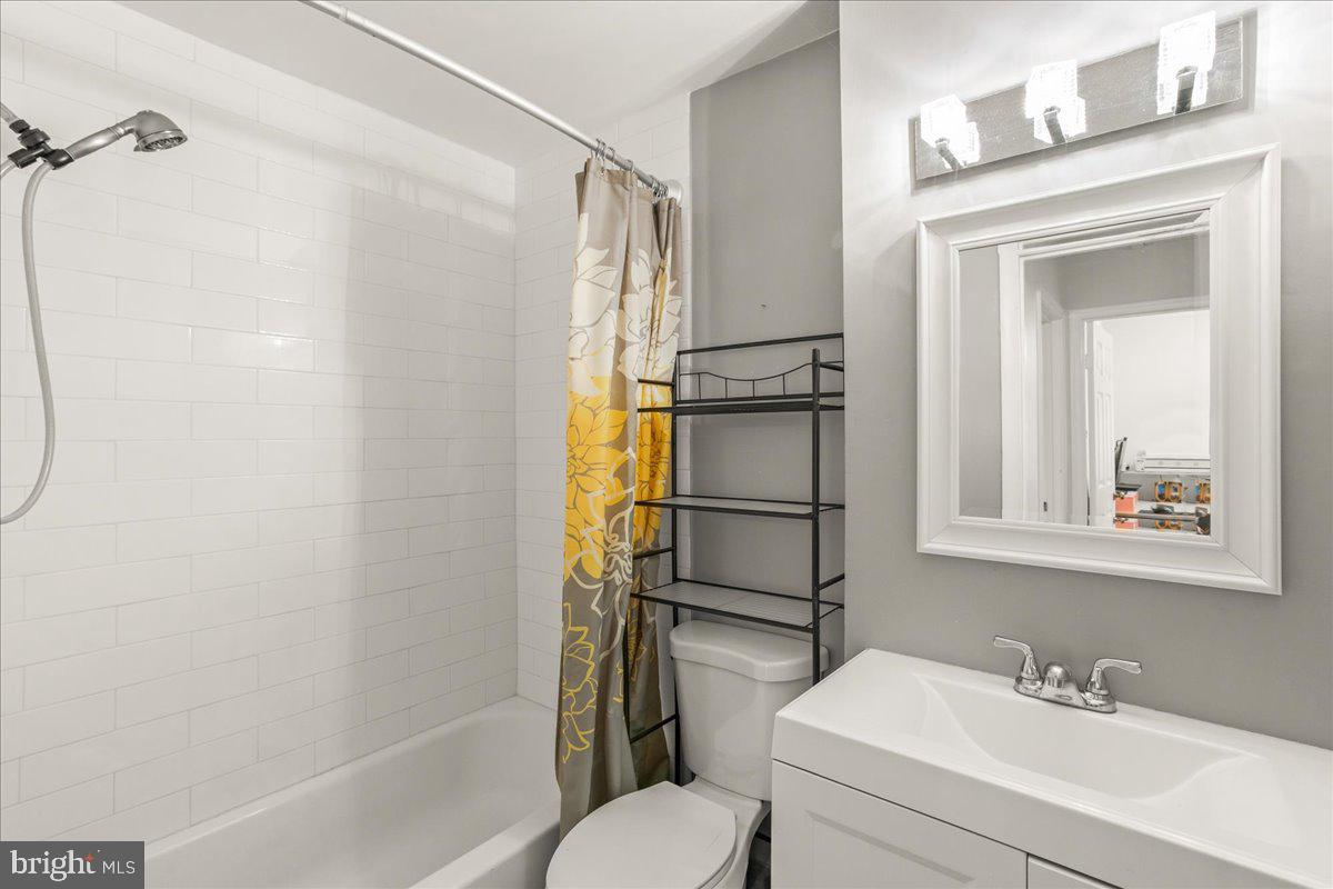 7213 Evanston Road Springfield, VA 22150 - Photo 22 of 37 Modern bathroom with sleek finishes.