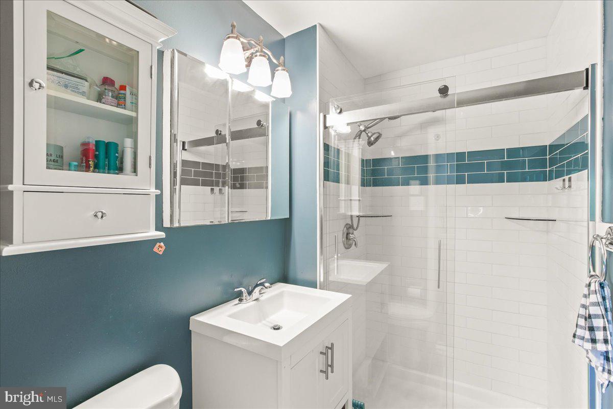 7213 Evanston Road Springfield, VA 22150 - Photo 27 of 37 Modern bathroom with sleek design.