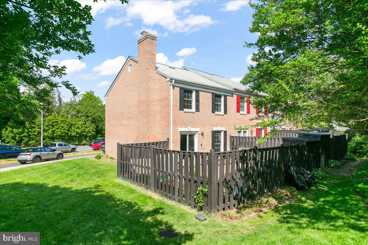 7213 Evanston Road Springfield, VA 22150 - Photo 37 of 37 Charming brick home with lush greenery.