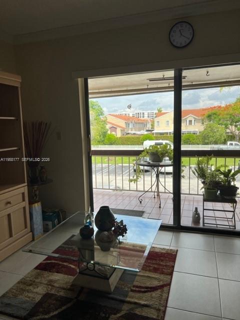 13783 Southwest 66th Street, Unit 215A Miami, FL 33183 - Photo 8 of 13 a living room with a large window