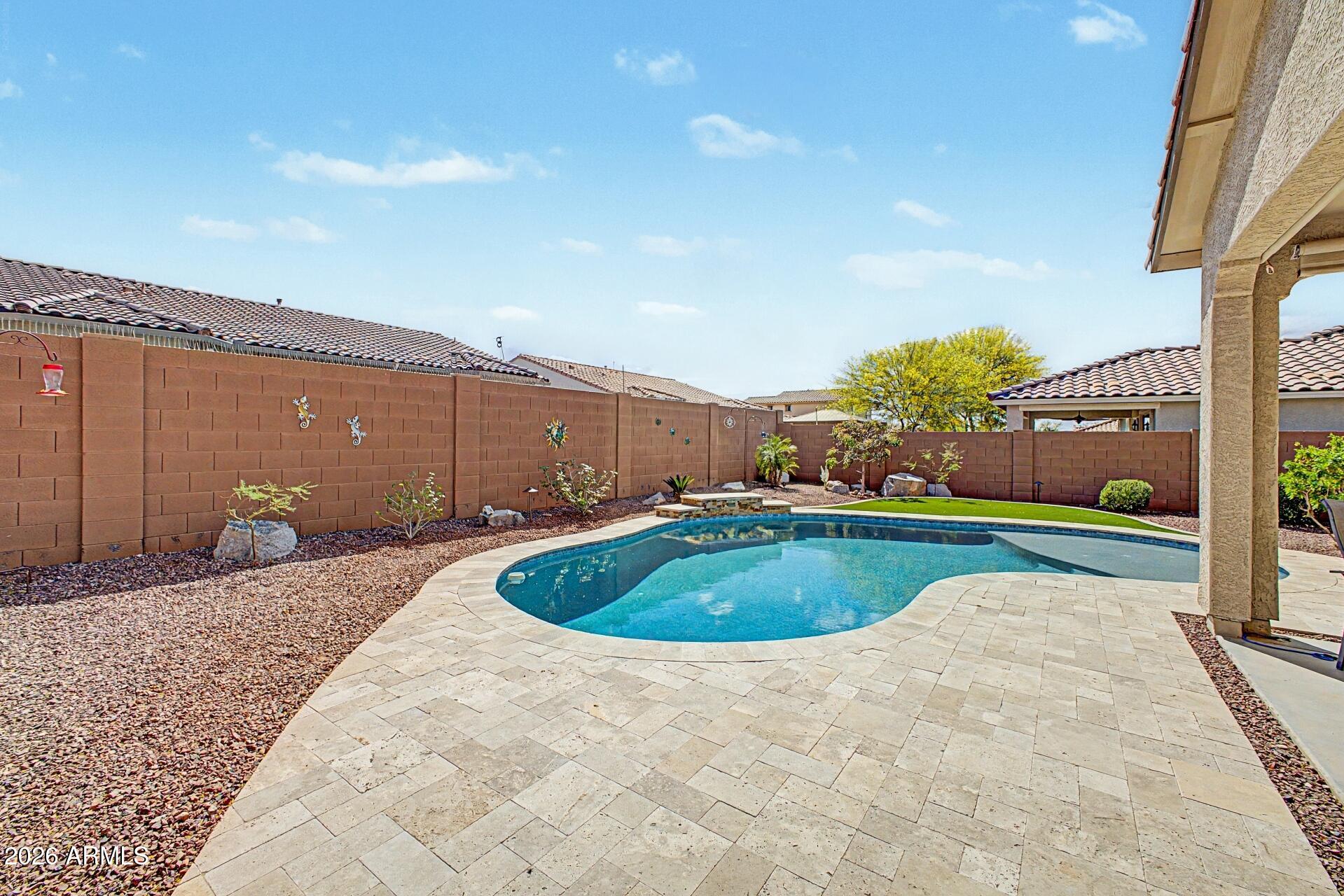 18021 West Indigo Brush Road Goodyear, AZ 85338 - Photo 26 of 47 a view of swimming pool