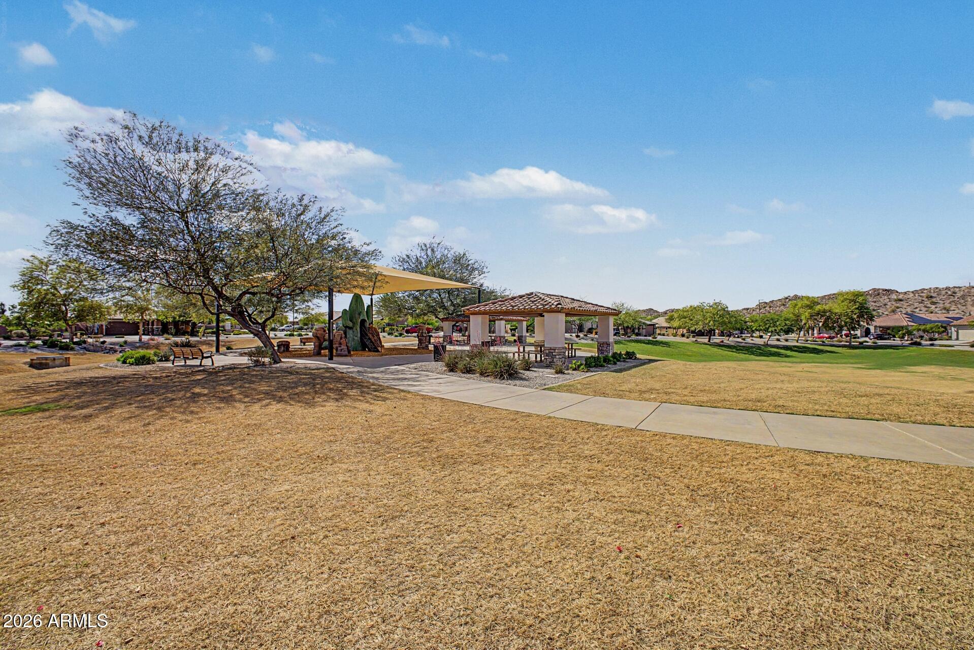 18021 West Indigo Brush Road Goodyear, AZ 85338 - Photo 34 of 47 a city view with lake view