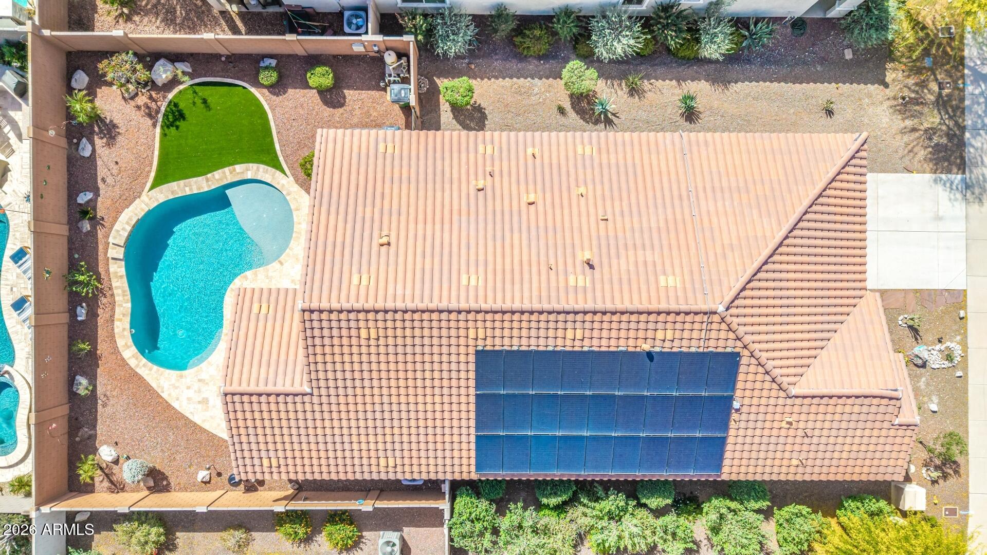 18021 West Indigo Brush Road Goodyear, AZ 85338 - Photo 37 of 47 an aerial view of a swimming pool