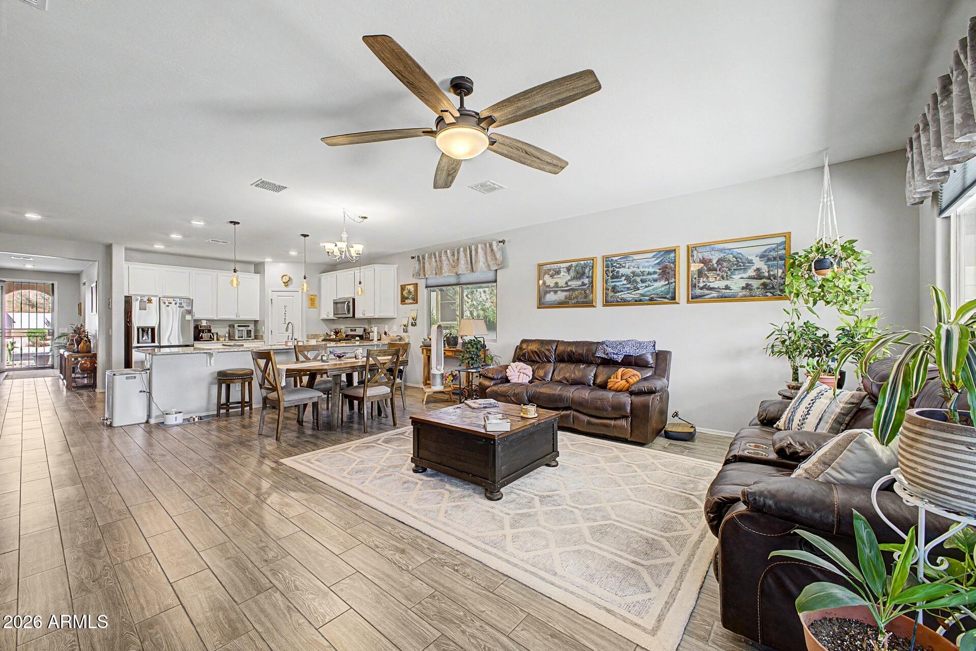 18021 West Indigo Brush Road Goodyear, AZ 85338 - Photo 7 of 47 a living room with furniture