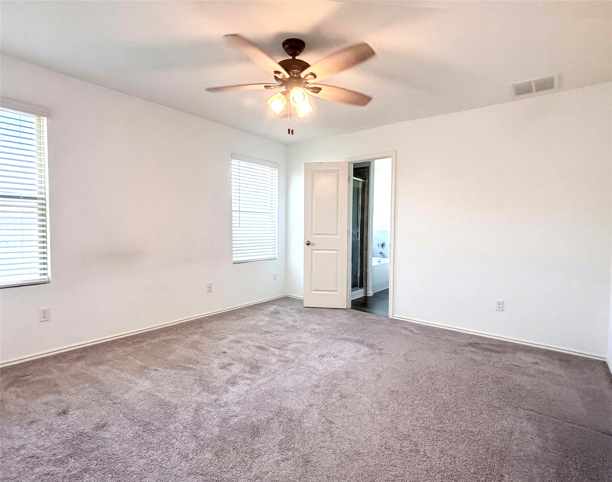 113 Star Pass Jarrell, TX 76537 - Photo 14 of 25 Primary Bedroom in the back of the home