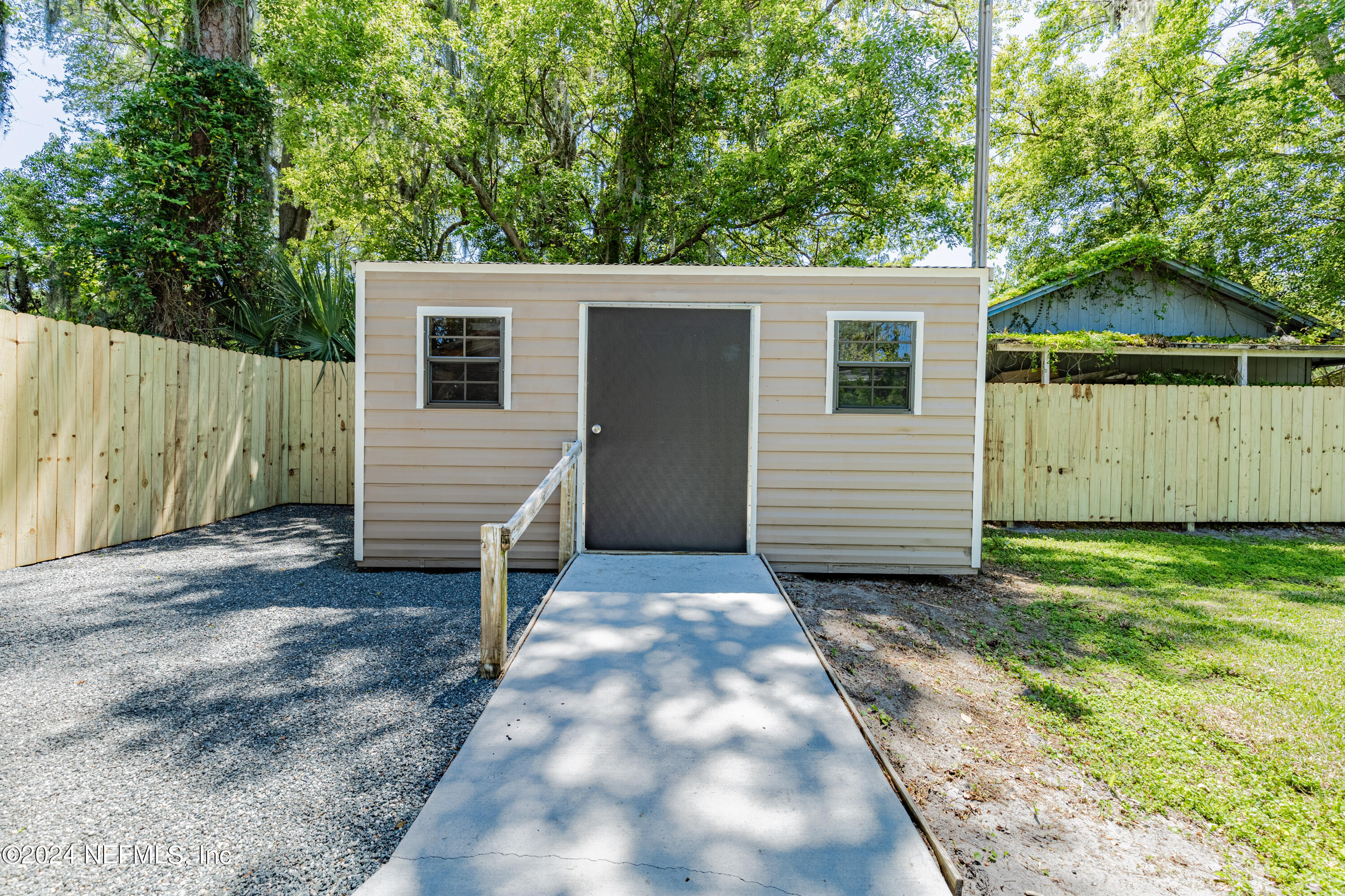 5342 Sharon Terrace Jacksonville, FL 32207 - Photo 33 of 33 a view of a house with a yard