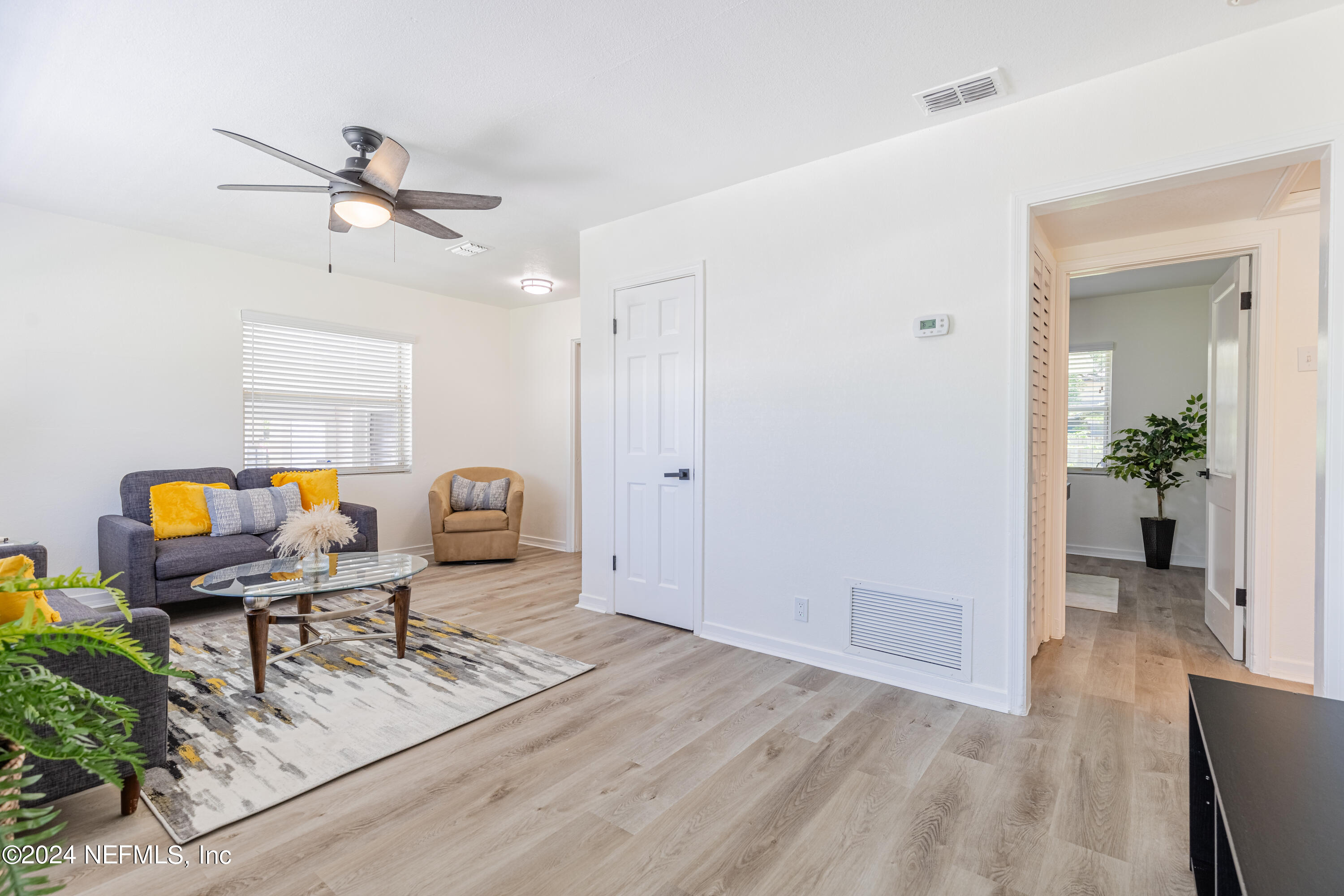5342 Sharon Terrace Jacksonville, FL 32207 - Photo 8 of 33 a workspace with furniture and wooden floor