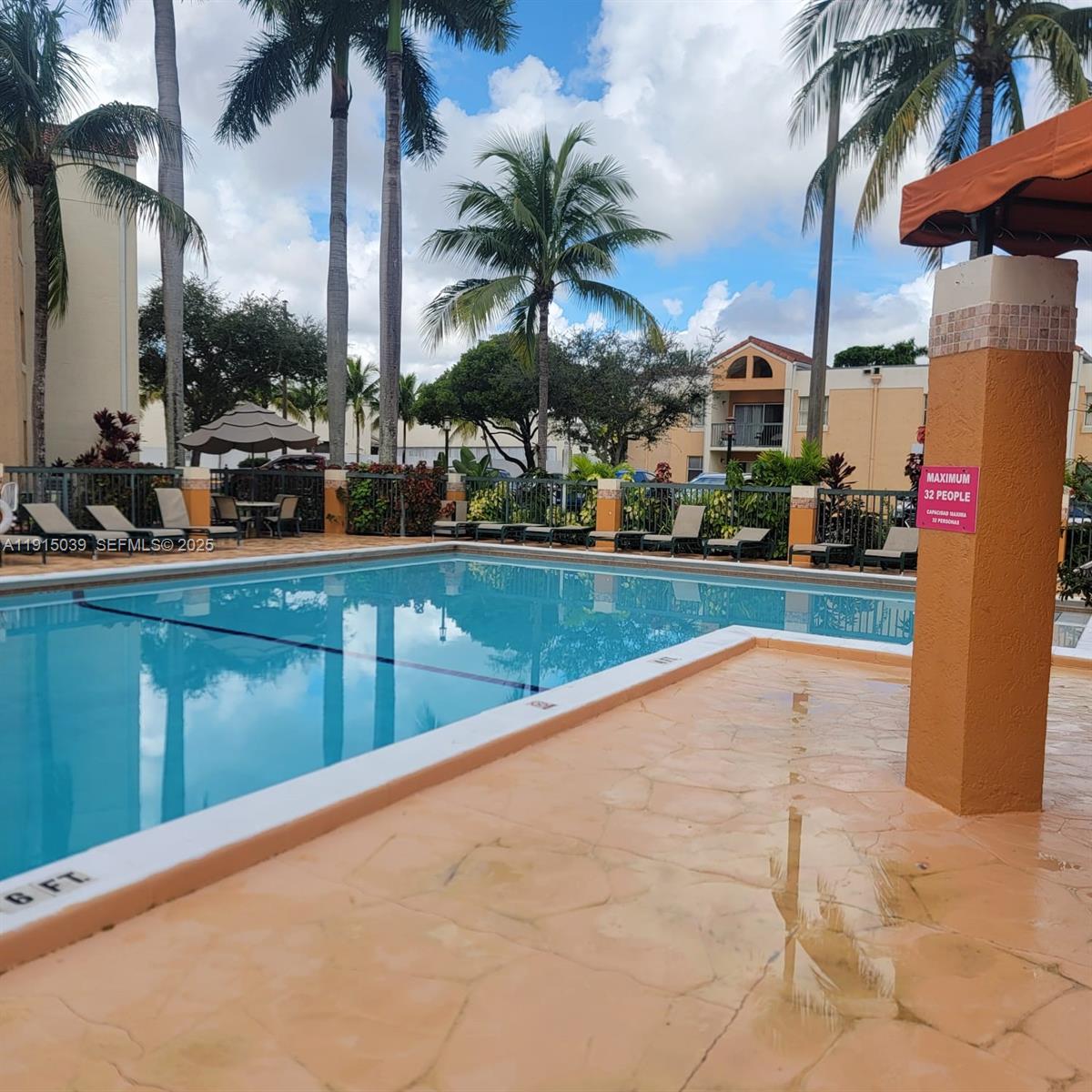 6272 Northwest 186th Street, Unit 201 Hialeah, FL 33015 - Photo 3 of 13 a view of outdoor space and swimming pool