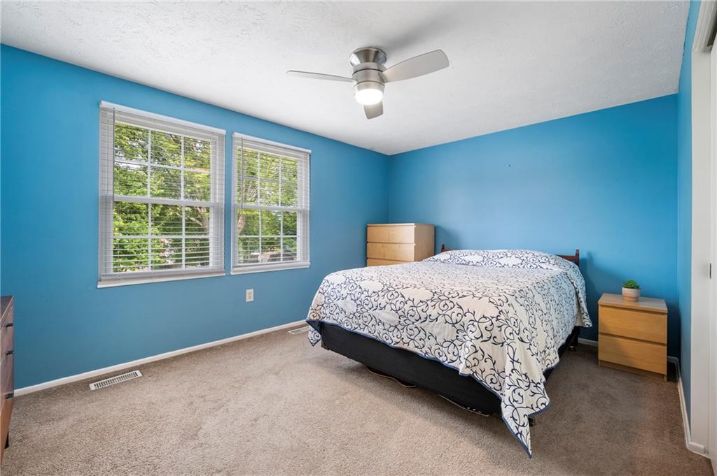 146 Pinehurst Drive Freedom, PA 15042 - Photo 16 of 30 a bedroom with a bed and window