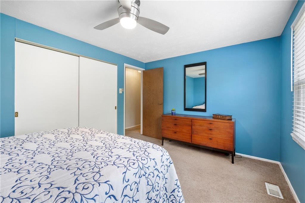 146 Pinehurst Drive Freedom, PA 15042 - Photo 17 of 30 a bedroom with a bed and a dresser