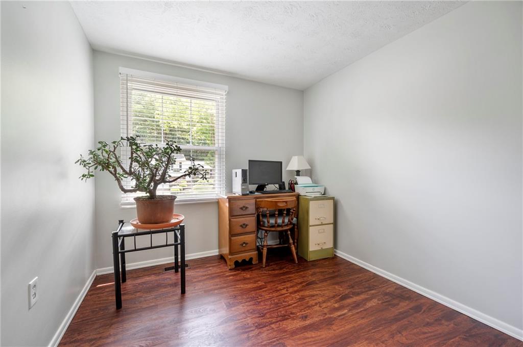 146 Pinehurst Drive Freedom, PA 15042 - Photo 19 of 30 a view of a workspace with furniture and a window