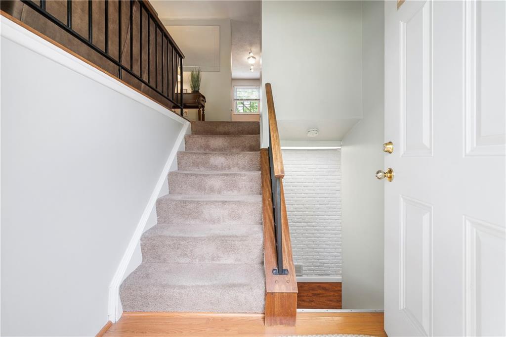 146 Pinehurst Drive Freedom, PA 15042 - Photo 20 of 30 a view of staircase with white walls and windows
