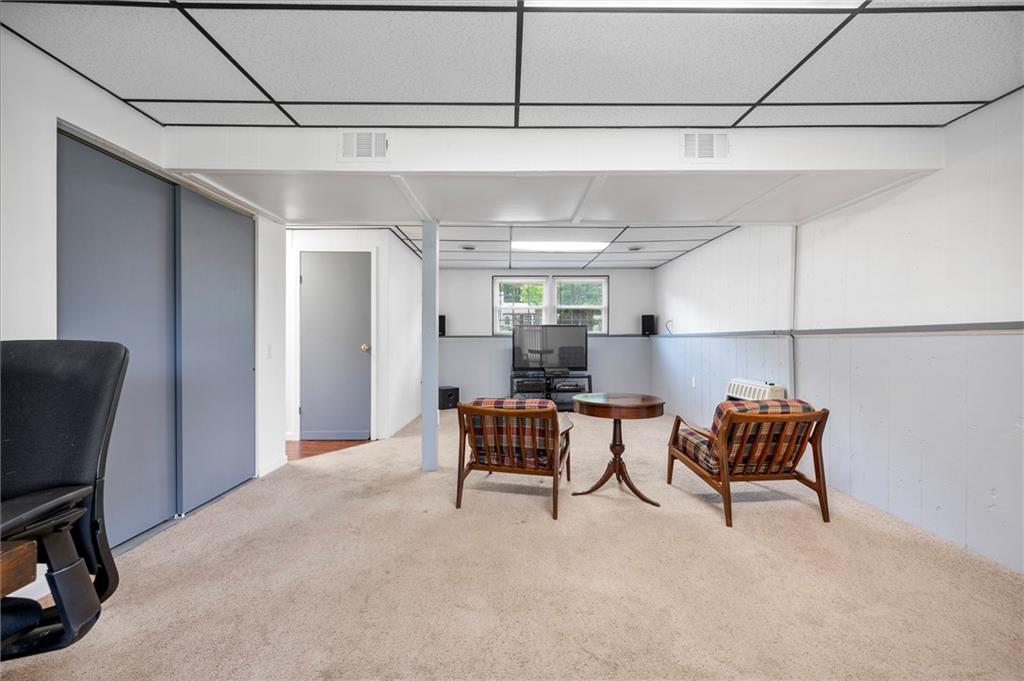 146 Pinehurst Drive Freedom, PA 15042 - Photo 22 of 30 a living room with furniture and a chair