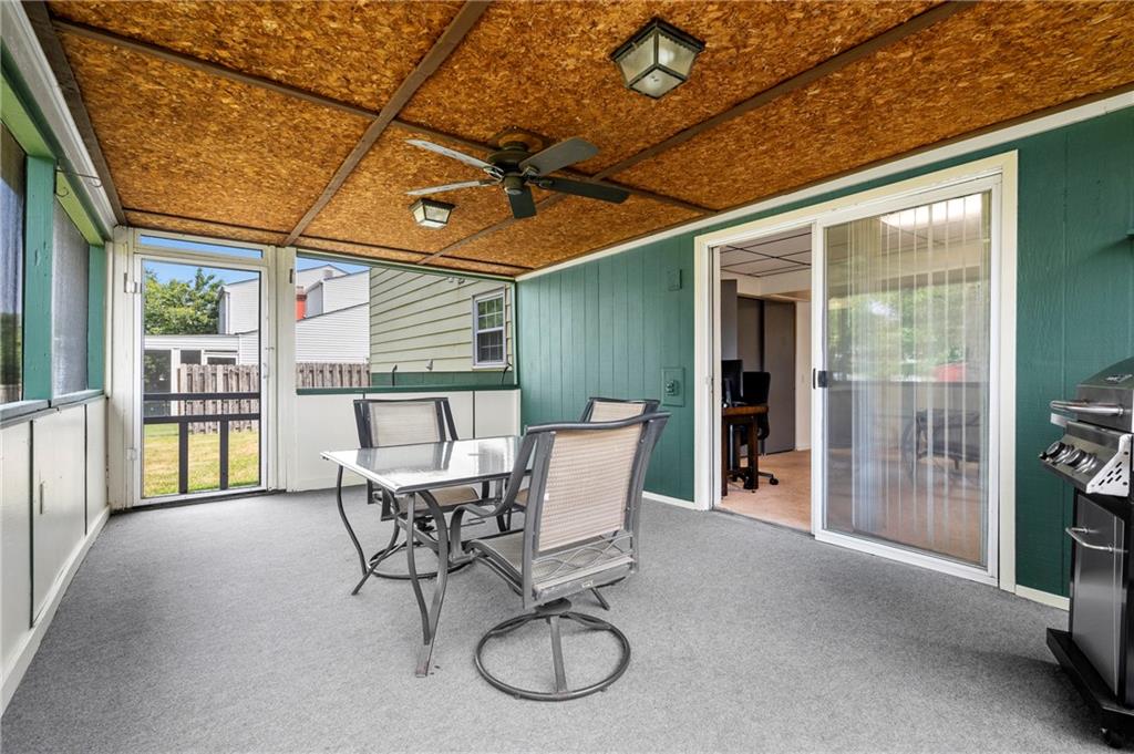 146 Pinehurst Drive Freedom, PA 15042 - Photo 26 of 30 a view of a patio with table and chairs