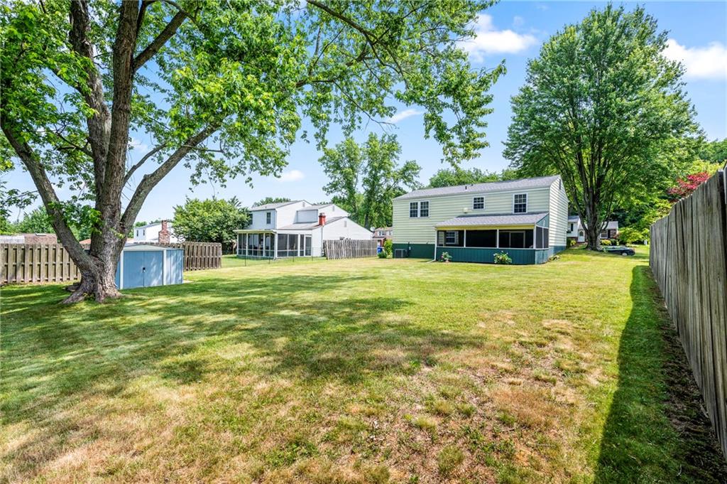 146 Pinehurst Drive Freedom, PA 15042 - Photo 30 of 30 a view of a house with a big yard and large trees