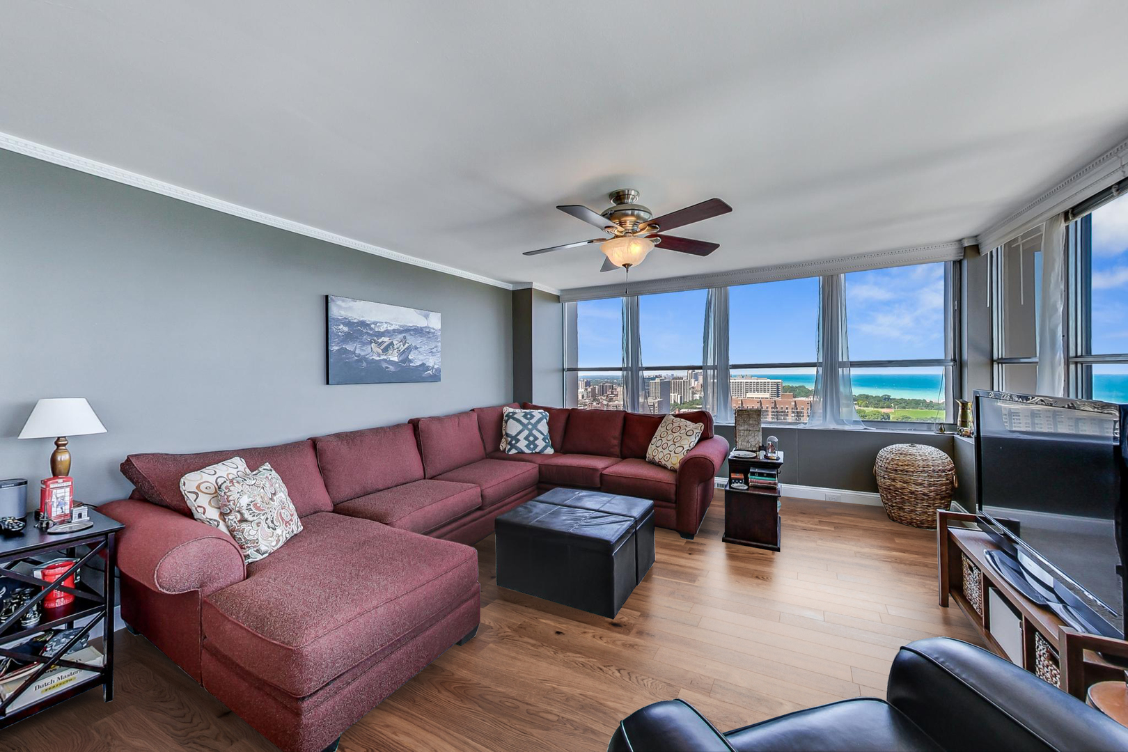 655 West Irving Park Road, Unit 3302 Chicago, IL 60613 - Photo 2 of 37 a living room with furniture and a large window