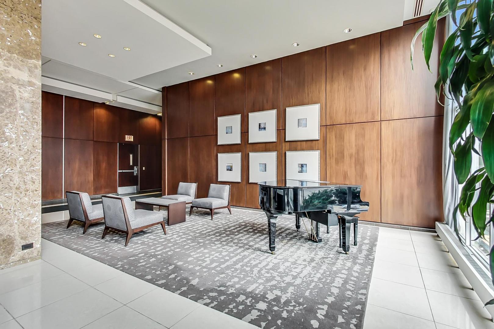 655 West Irving Park Road, Unit 3302 Chicago, IL 60613 - Photo 34 of 37 a living room with furniture