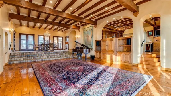 a kitchen that has a stove and a table in it