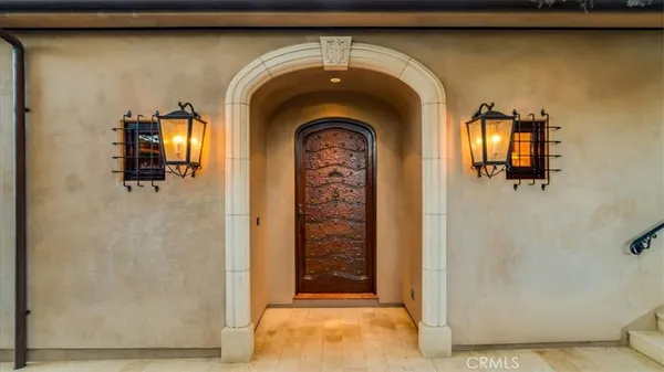 a view of a hall with wooden floor