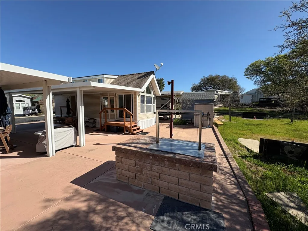 2358 Comanche Way Paso Robles, CA 93446 - Photo 11 of 30 a view of a house with swimming pool and a yard