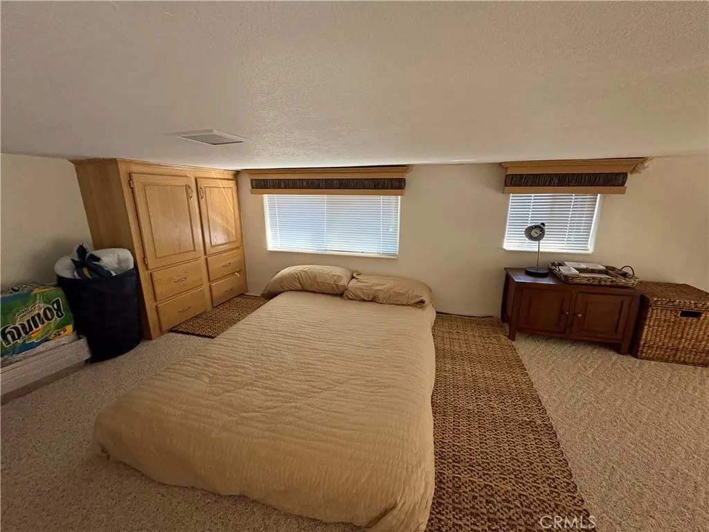 2358 Comanche Way Paso Robles, CA 93446 - Photo 16 of 30 a bedroom with a bed and dresser