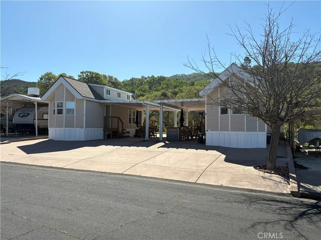2358 Comanche Way Paso Robles, CA 93446 - Photo 2 of 30 a front view of a house with a yard and garage