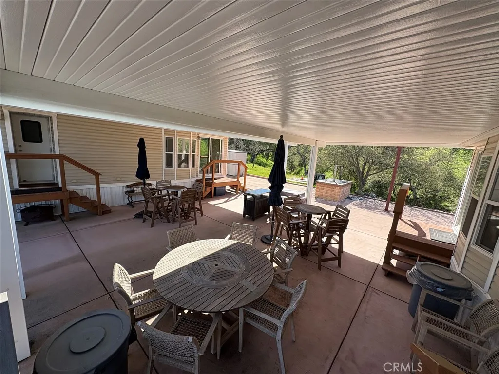 2358 Comanche Way Paso Robles, CA 93446 - Photo 22 of 30 a dining room with furniture window and wooden floor