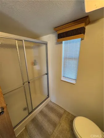 a kitchen with a refrigerator and a sink