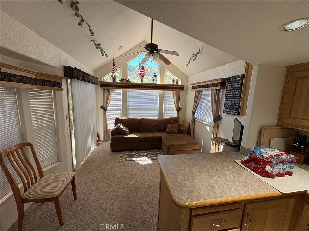 2358 Comanche Way Paso Robles, CA 93446 - Photo 28 of 30 a living room with furniture and a wooden floor