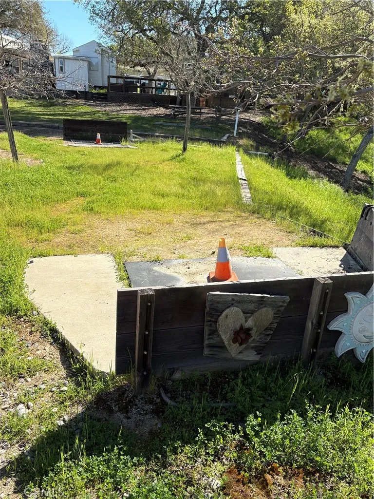 2358 Comanche Way Paso Robles, CA 93446 - Photo 8 of 30 a view of a swimming pool with a yard