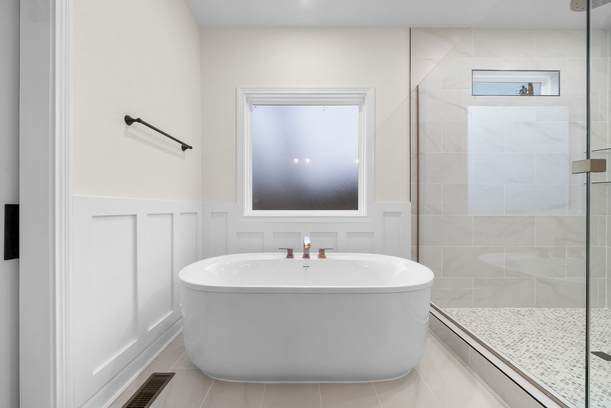 1800 Gholson Road Clarksville, TN 37043 - Photo 18 of 33 a white bath tub sitting next to a bathroom sink