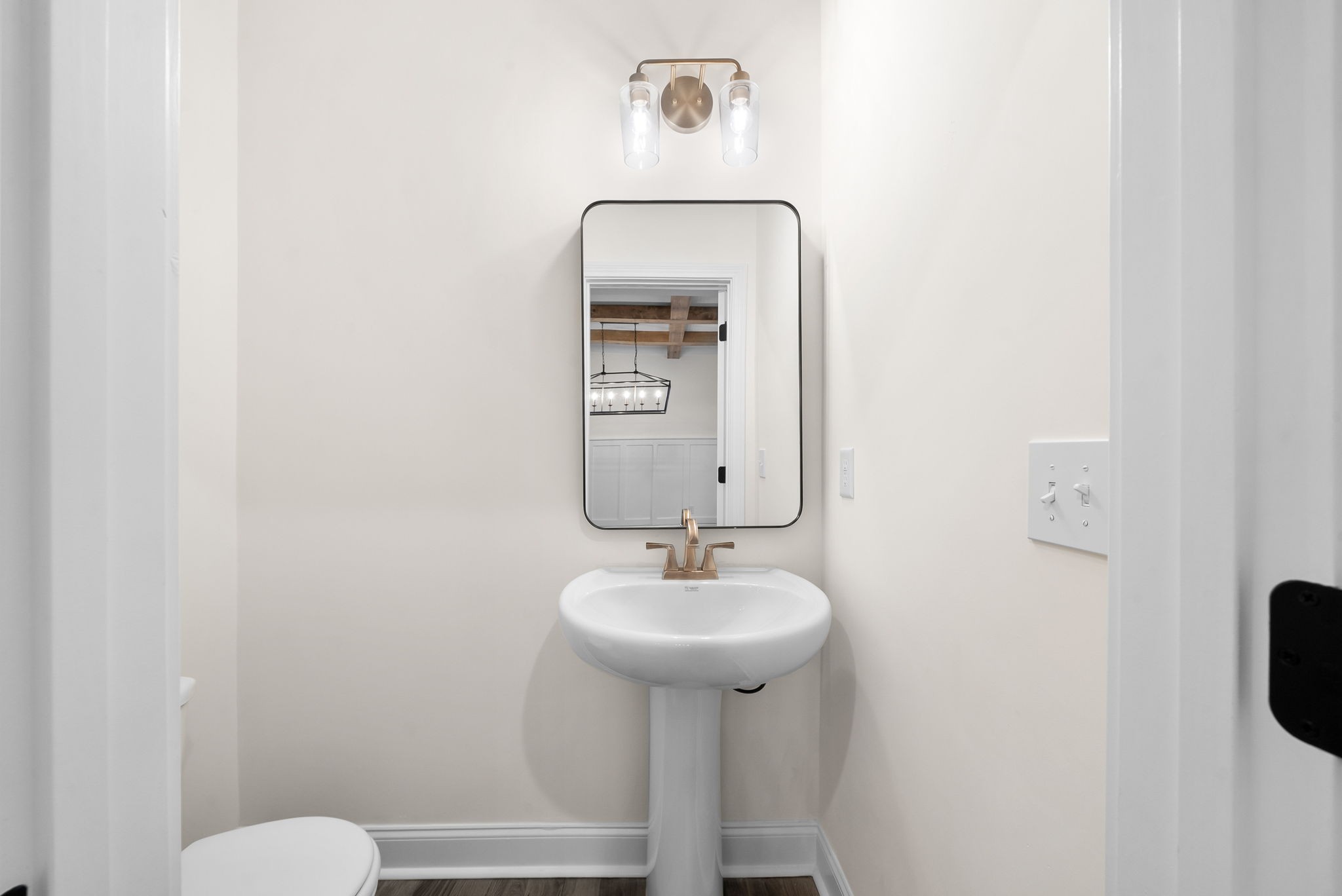 1800 Gholson Road Clarksville, TN 37043 - Photo 24 of 33 a bathroom with a sink a mirror and a toilet