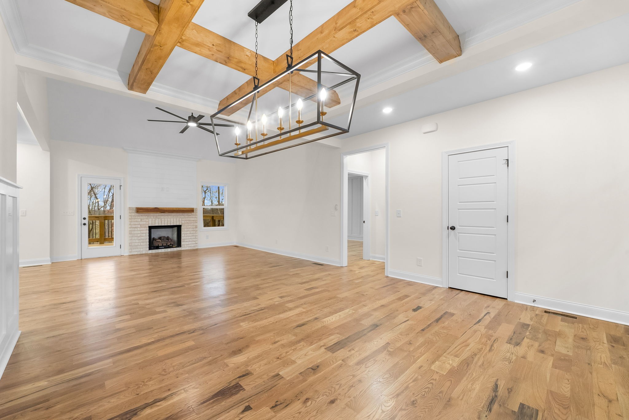 1800 Gholson Road Clarksville, TN 37043 - Photo 31 of 33 a view of empty room with wooden floor and fireplace