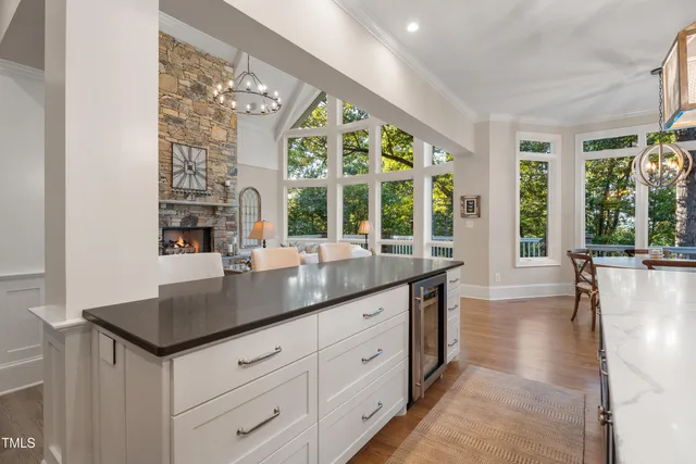 a kitchen with stainless steel appliances granite countertop a stove and a sink