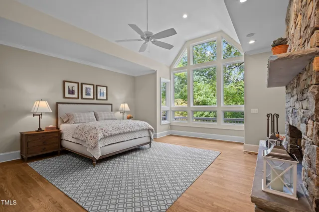 a living room with furniture and a book shelf