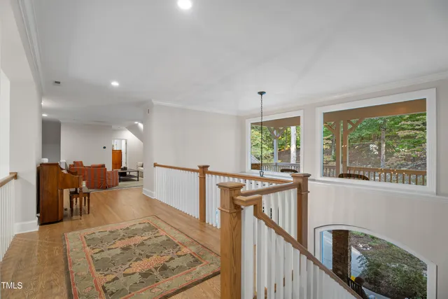 a view of a two chairs in the balcony