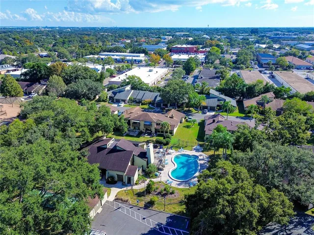 a view of a swimming pool with a patio